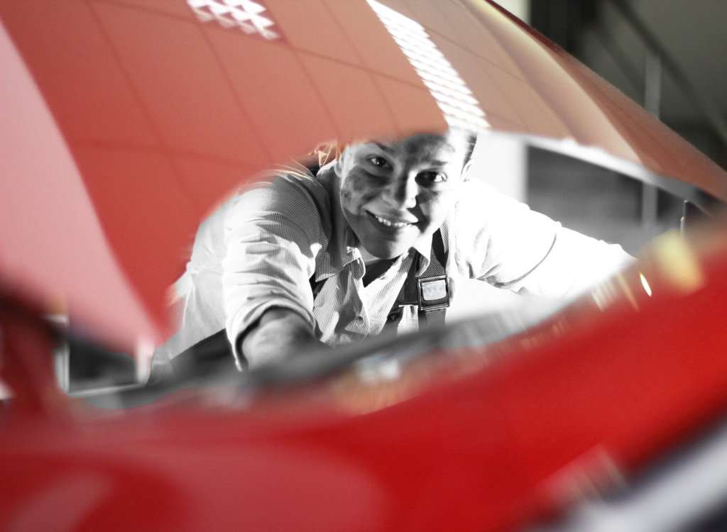 Car mechanic repair an engine